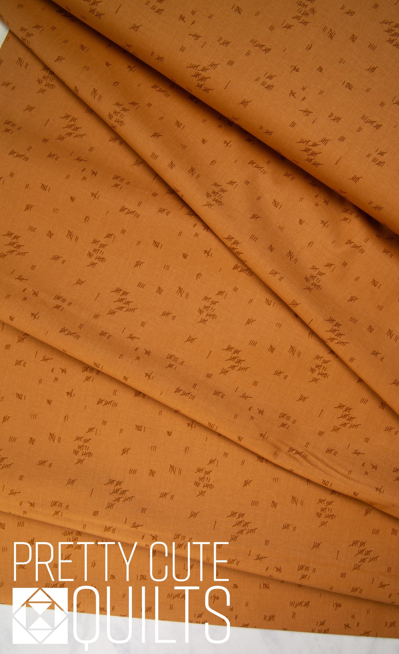 Tally in Jute - Fabric from the Basement - A-461-O by Giucy Giuce, for Andover | Tan beige brown fabric with crosshatch marks